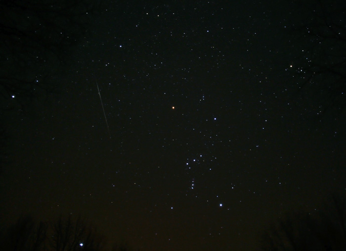 Geminid meteor near Orion